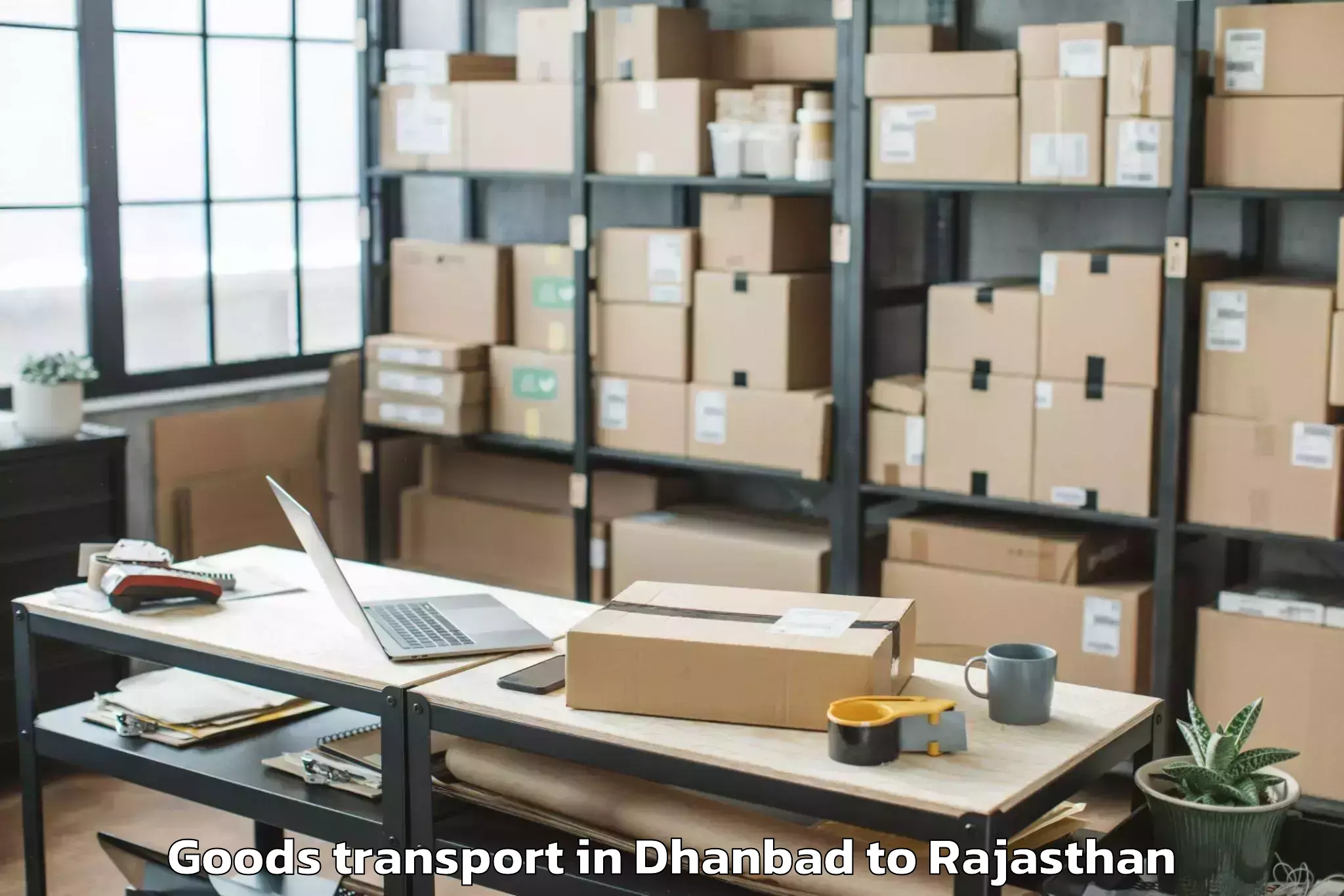 Top Dhanbad to Chaksu Goods Transport Available